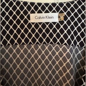 CK wrap dress, perfect for work. Silver detail at the shoulder.